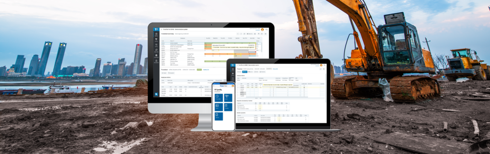 COINS construction management software displayed on a laptop, phone and desktop computer, on a construction site background.